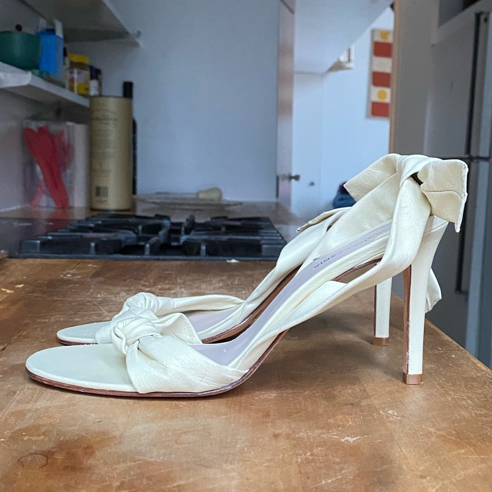 BCBG off-white strappy heels.